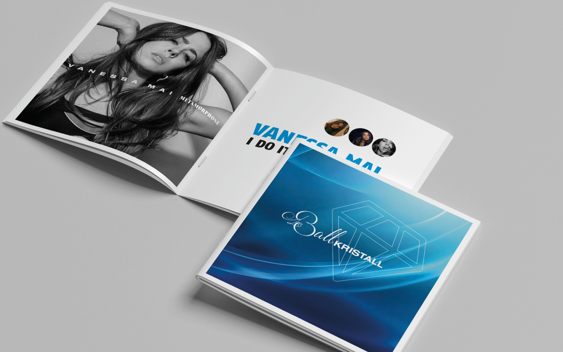 Zwei offene Magazine auf grauem Hintergrund, eines zeigt Vanessa Mai mit dem Titel "Metamorphose", das andere trägt den Titel "Ball Kristall" in blauer Schrift.