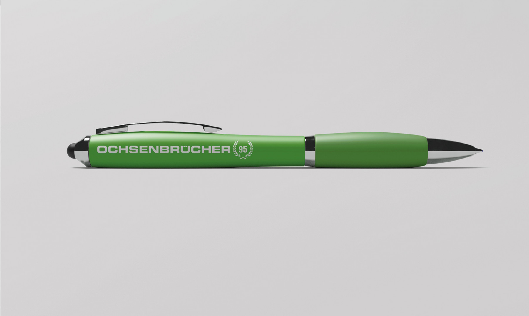 Grüner Kugelschreiber mit der Aufschrift OCHSENBRÜCHER und der Zahl 95, auf einem hellen Hintergrund, ideal für Schreibwarenliebhaber und als Werbegeschenk.